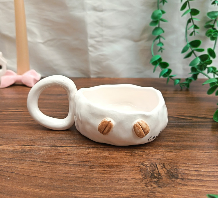 ماگ سرامیکی دست ساز دفرمه طرح قهوه cooffe